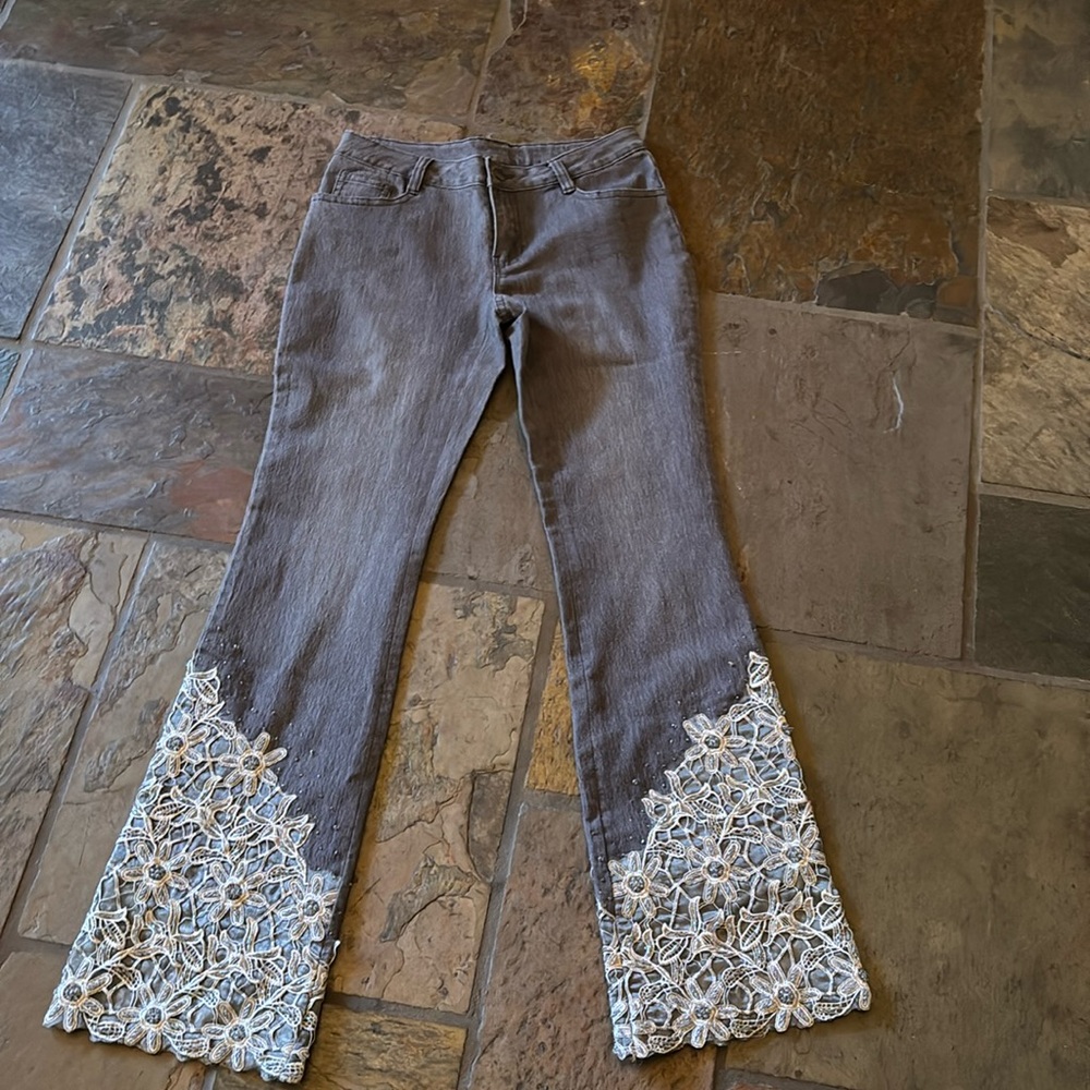 NWOT AZI grey jeans with incredible cut lace & beading around bottom of jeans.